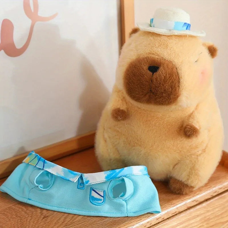 Peluche de carpincho azul, rosa y amarillo