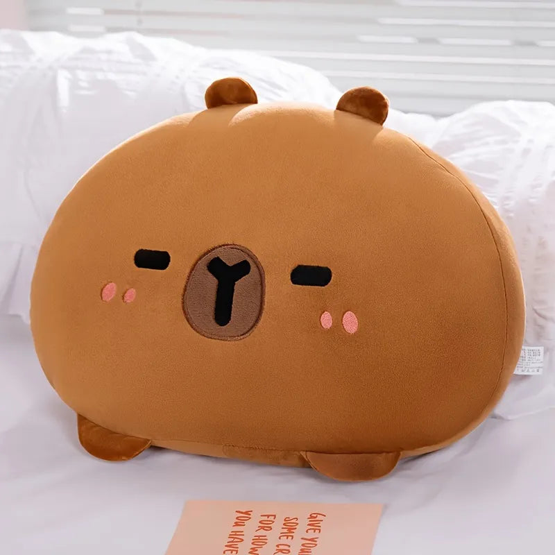 Linda almohada de peluche de carpincho