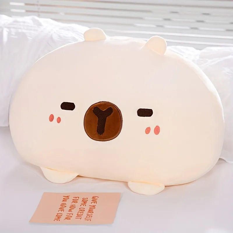 Linda almohada de peluche de carpincho