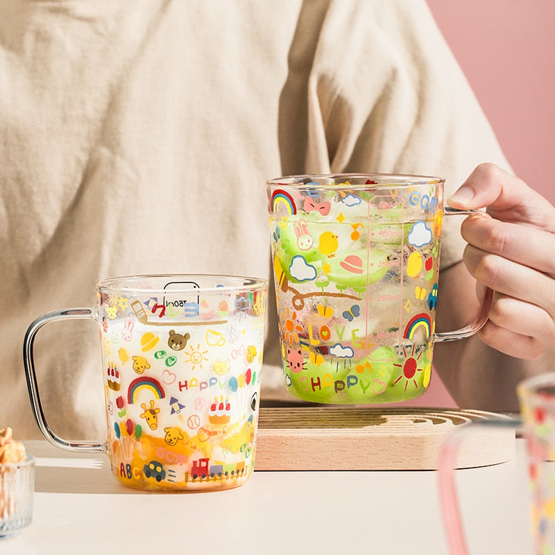 Taza medidora de vidrio de dibujos animados