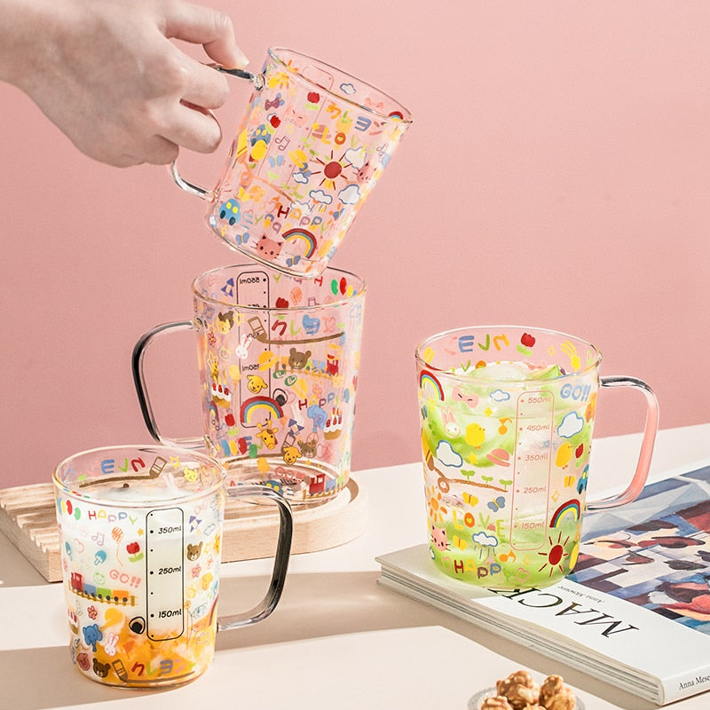 Taza medidora de vidrio de dibujos animados