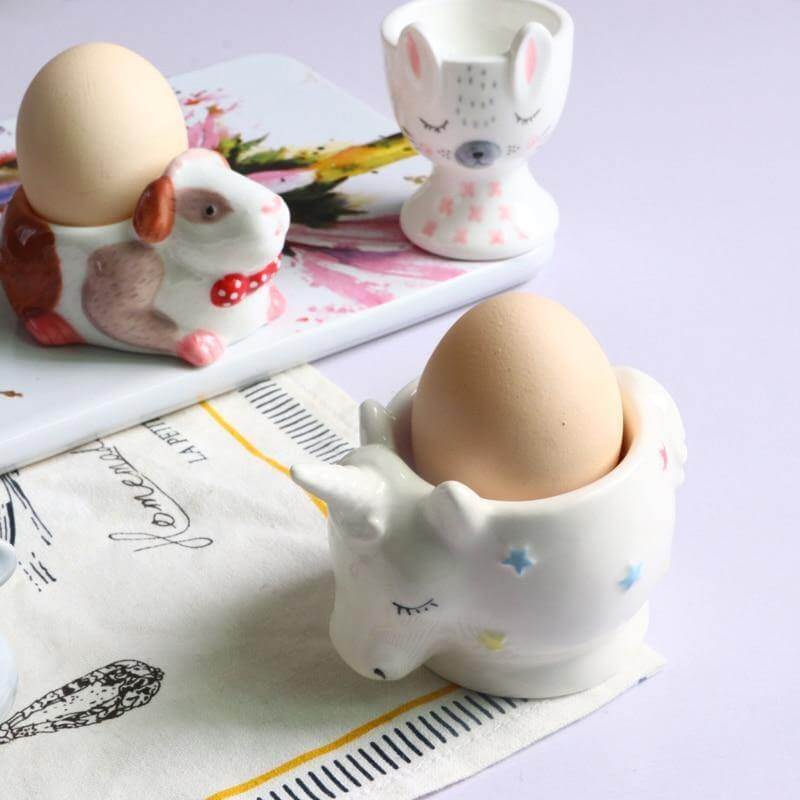 2 porta huevos de cerámica con forma de animalito para el desayuno